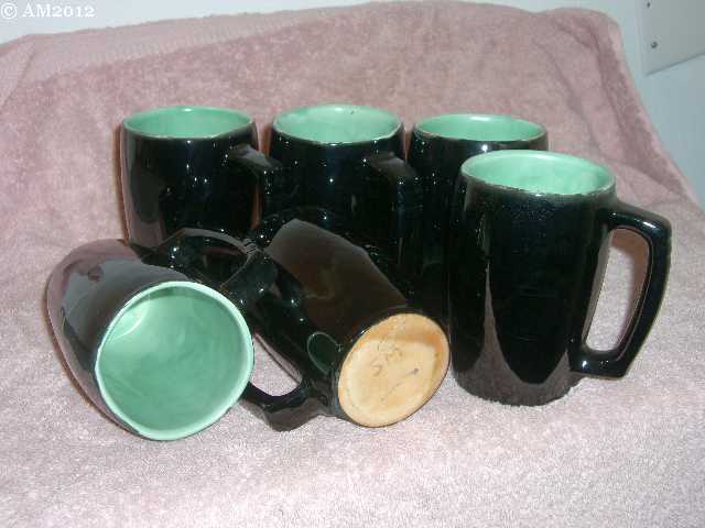 Plainsman 5M mugs glazed black and jade green